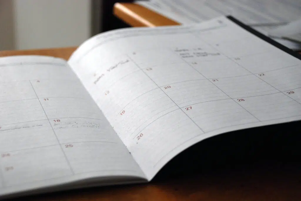 An open planner showing a monthly calendar